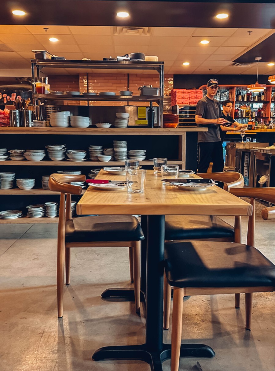 Dining room and open kitchen at Spina Pizza, Atlanta Dairies